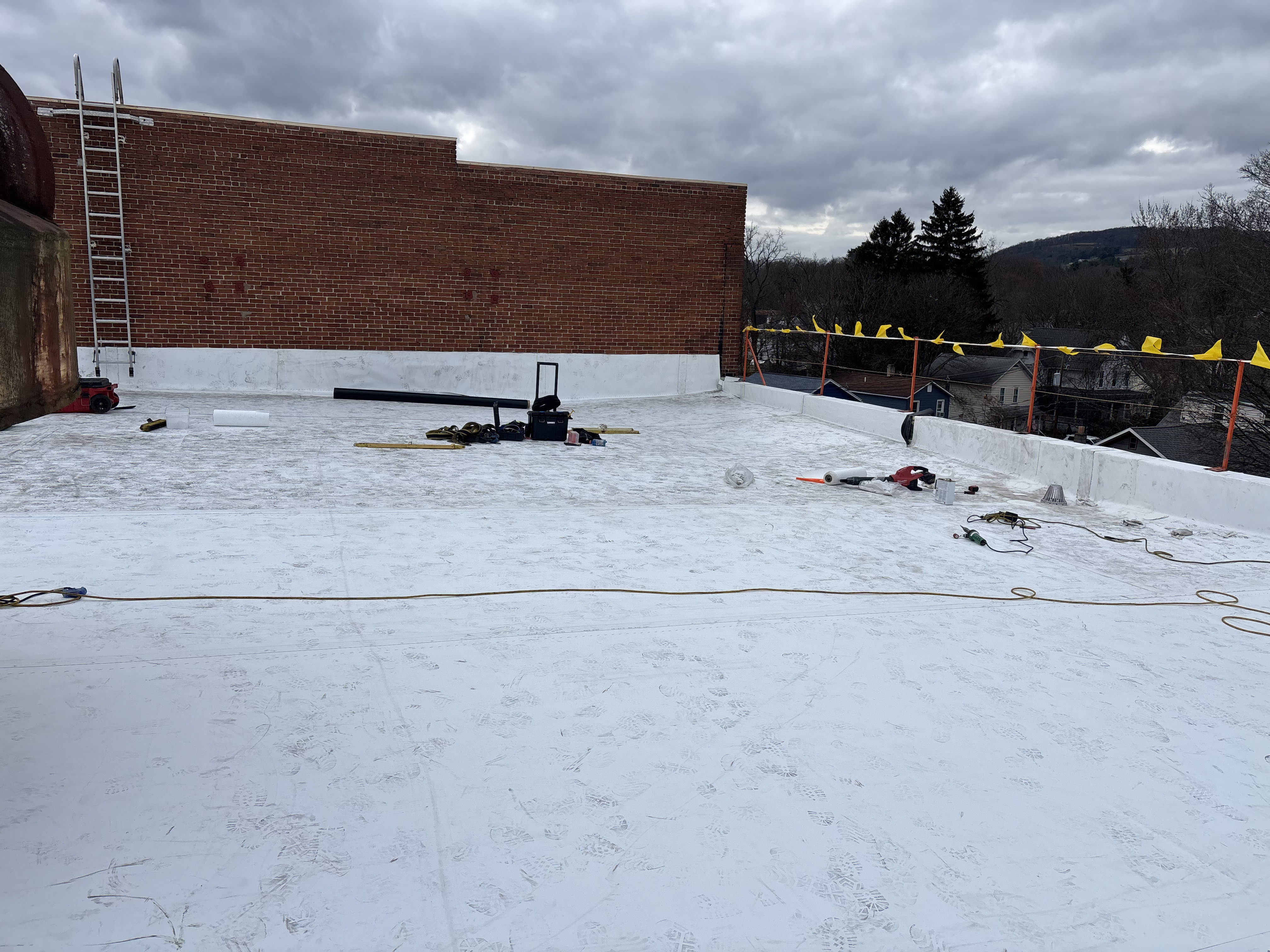 Work in progress on lower flat roof